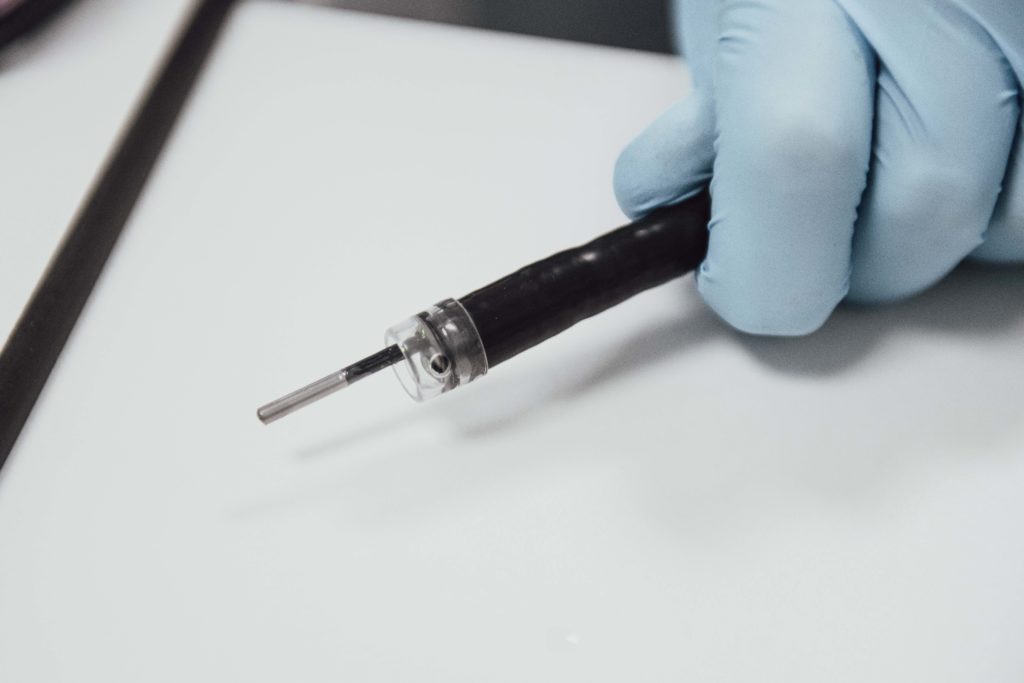 photo of the probe protruding from an endoscope